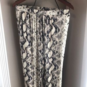 Eesome New large reptile print joggers.